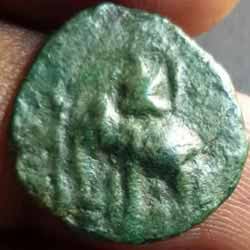 Sangam Chola Coin Standing elephant above symbol 